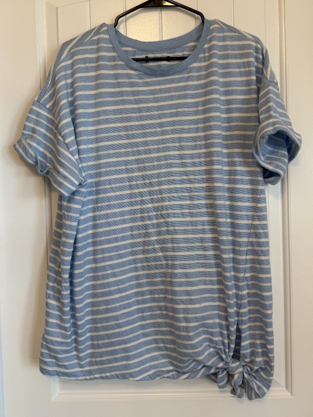 Light blue and white horizontal striped t-shirt